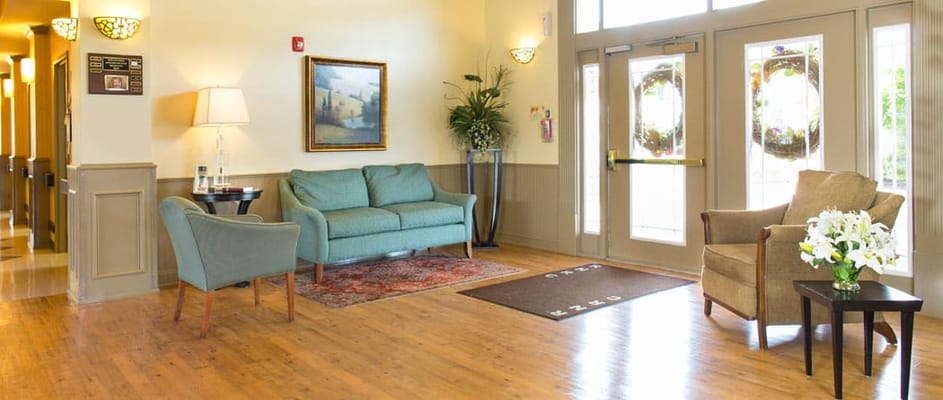Bright interior of a senior living facility lobby