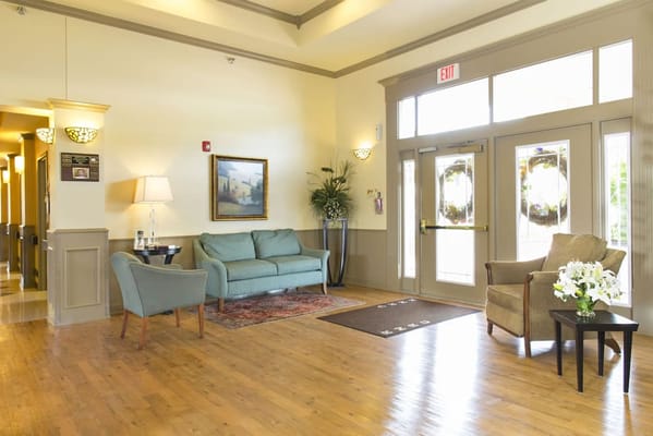 Welcoming lobby area with comfortable seating and decor
