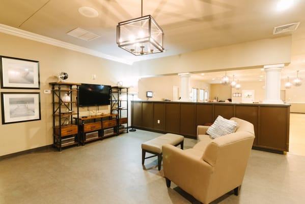 Cozy common area with seating and a television