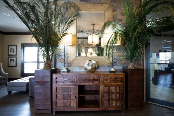 Elegant lobby furnishings with plants and decor