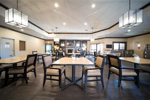 Bright dining area with ample seating and decor