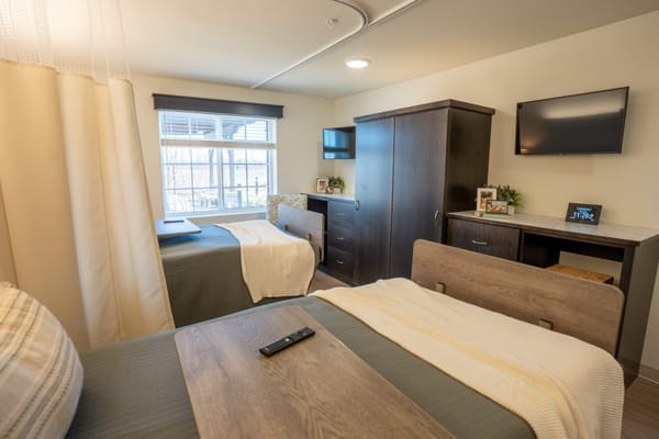 A cozy shared room in a senior living facility