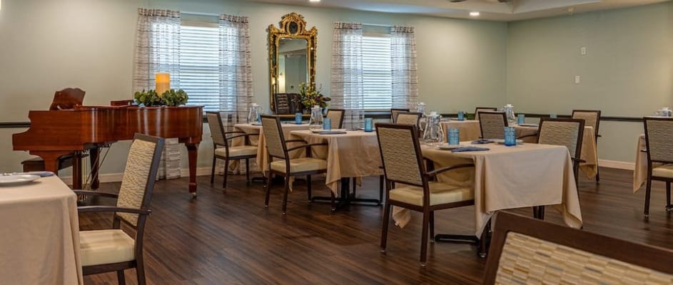 Dining area with tables set for a meal service