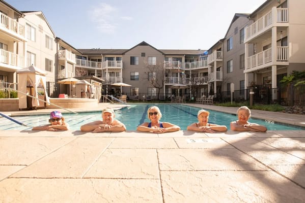 Residents enjoying time by the pool