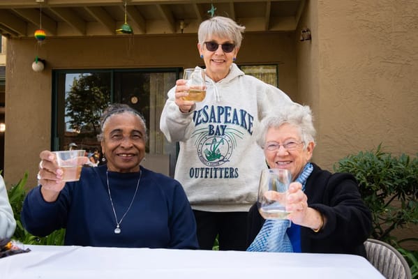 Residents enjoying drinks and celebrating together