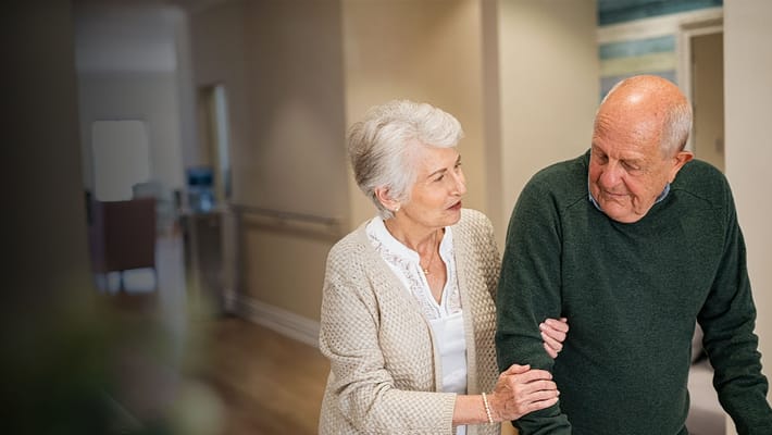 Seniors interacting in a warm interior space