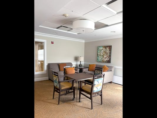 Cozy common area with couches and a table