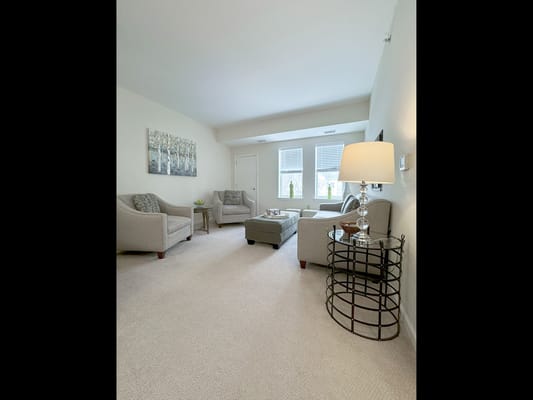 Cozy interior room with seating and natural light