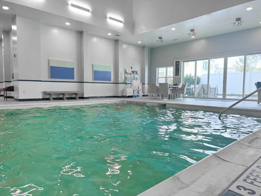 Indoor swimming pool with lounge area