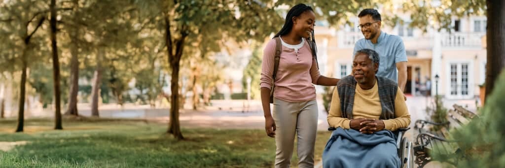 Residents enjoying a walk in the garden