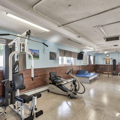 Exercise equipment in a bright fitness room