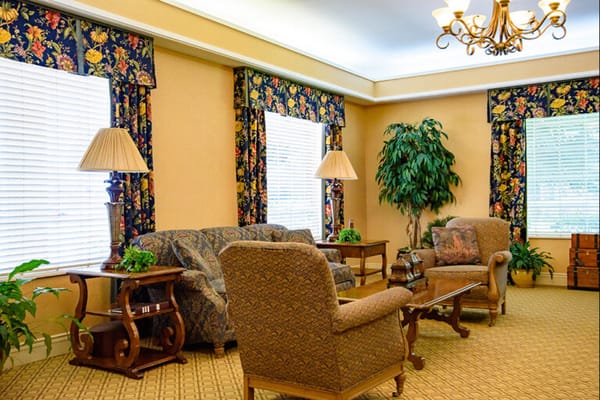 Cozy living area with floral decor and plants