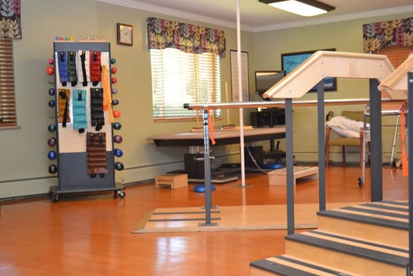 Interior view of an activity therapy room with equipment