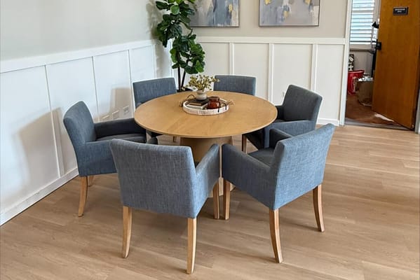 A cozy interior seating area with a table and chairs