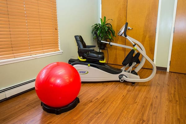 Fitness equipment in a bright therapy room