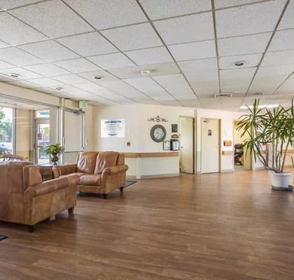 Bright interior lobby with seating and plants