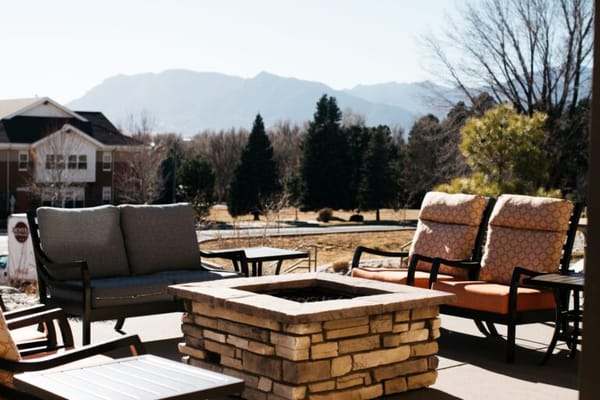 Outdoor seating area with mountain view