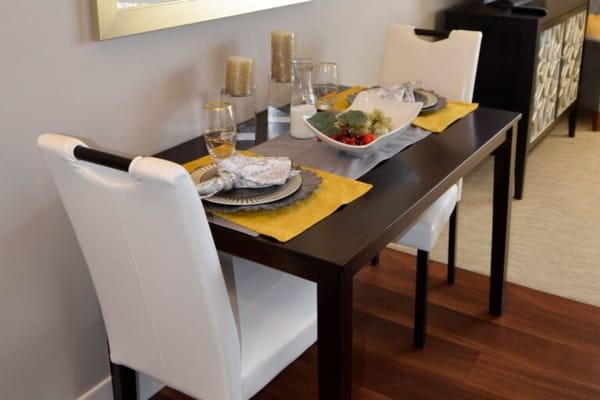 Dining table set for two with decorative dish