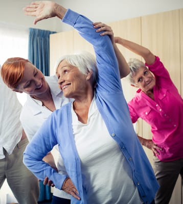 Seniors participating in a group exercise session
