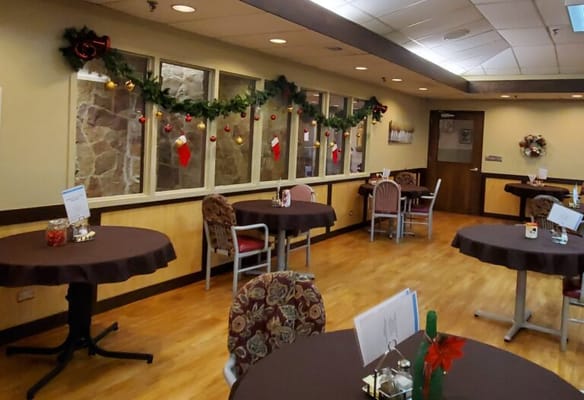 Bright dining room decorated for the holidays
