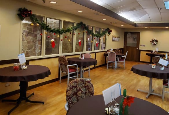 Bright dining room decorated for the holidays