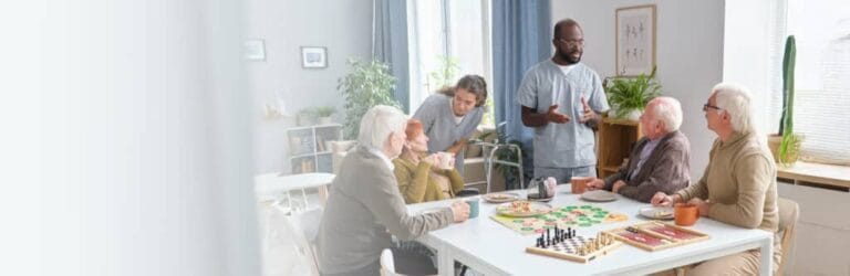 Residents engaging in games in a bright common area