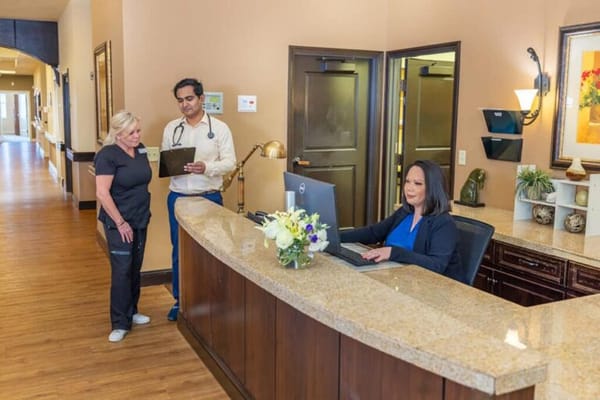 Staff interacting in a facility reception area