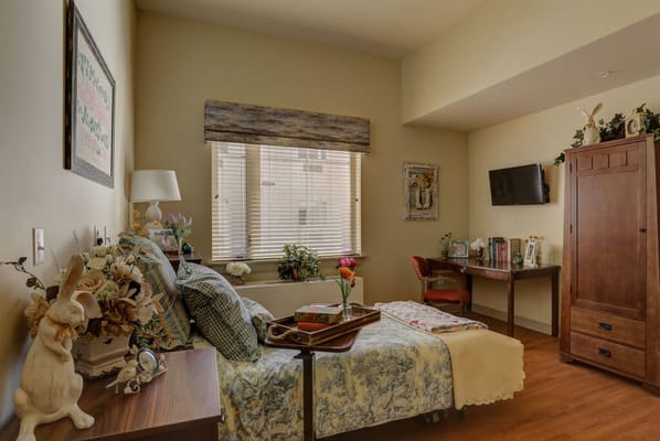 Cozy senior room with bed and decorative items