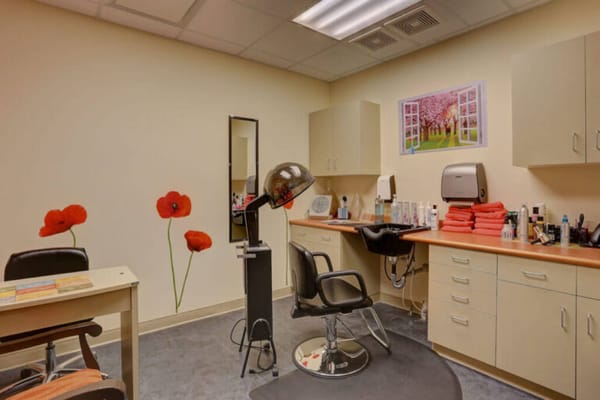 Interior view of a beauty salon with styling chairs