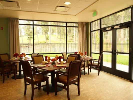 Dining room with tables set for a meal