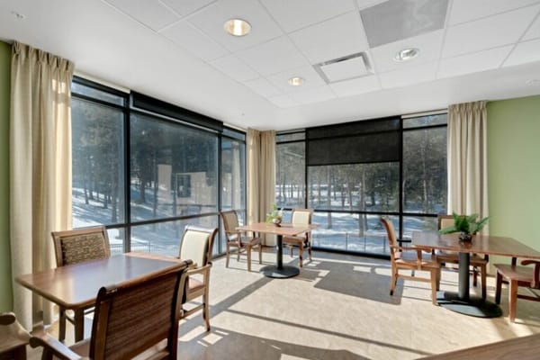 Bright common area with tables and chairs
