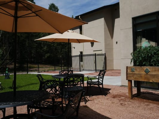 Outdoor seating area with umbrellas and tables
