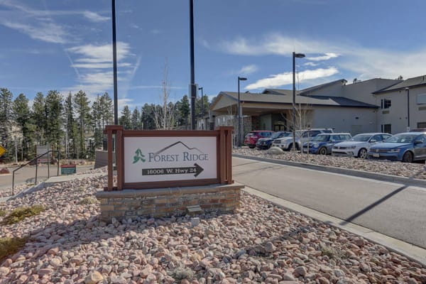Entrance sign and exterior of Forest Ridge facility