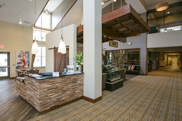 Welcoming lobby area with reception desk and seating