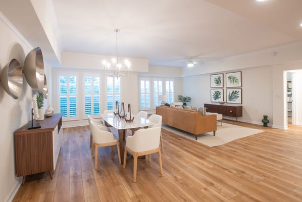 Spacious common area with dining table and comfortable seating