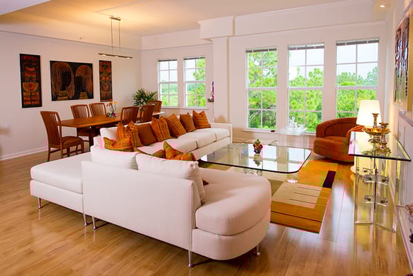 Bright and modern common area with seating and dining table