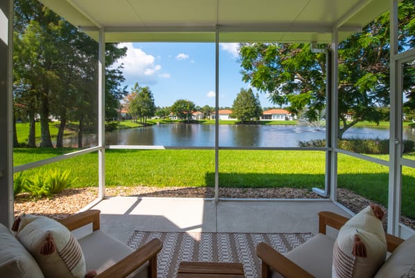View from a porch overlooking a serene lake