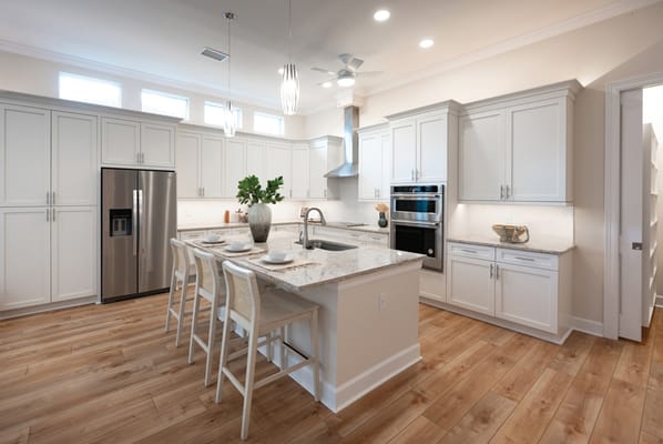 Modern kitchen with white cabinets and granite countertops