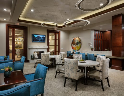 Elegant dining room with round tables and vibrant decor