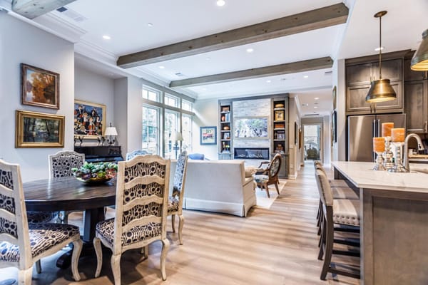 Bright interior common area with dining table and seating