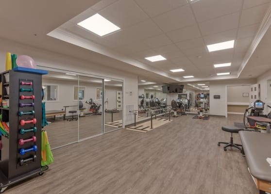 Interior view of an exercise room with equipment