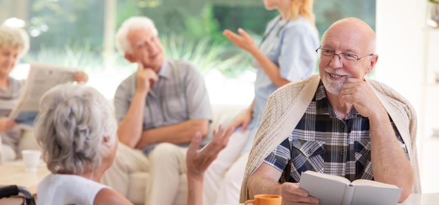 Residents engaging in conversation in a common area