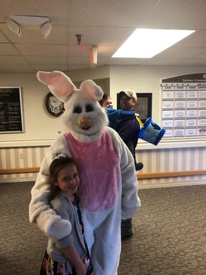 Residents enjoying a visit from the Easter Bunny