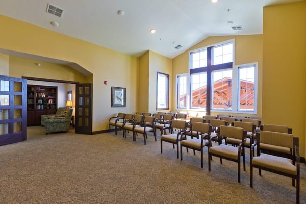 Bright common area with seating and natural light