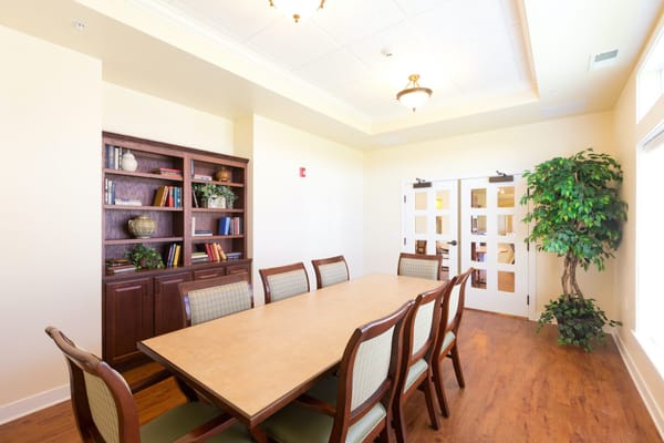 Bright interior of a dining area with a large table