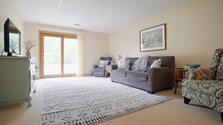 Cozy common area with seating and natural light