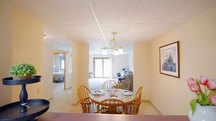 Cozy dining area in a senior living unit