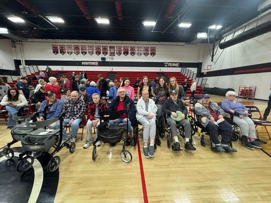Residents and staff gathered at a communal event