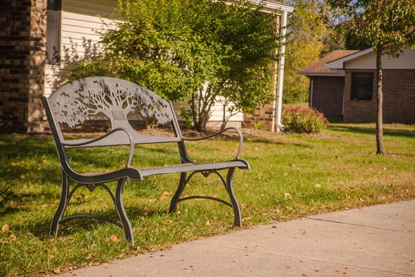 A decorative bench in an outdoor area