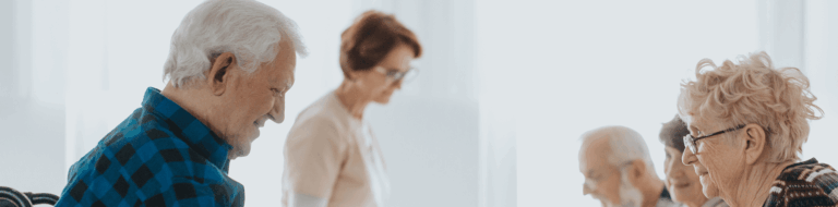 Residents and staff engaged in an activity together